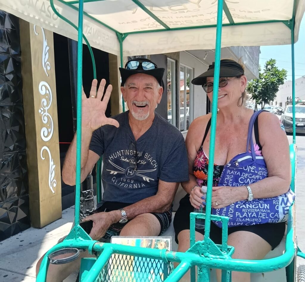 Couple enjoying a private Cabo San Lucas pedicab tour